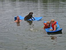 Adoptive Family Photo: Bill Swimming with Daisey and His Niece, click to view bigger version