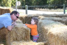 Adoptive Family Photo: Marty and Luci Lee Having Fun in a Maze, click to view bigger version