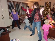 Adoptive Family Photo: Having Fun Playing Just Dance on Wii, click to view bigger version