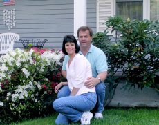 Adoptive Family Photo: Enjoying the Beautiful Flowers, click to view bigger version