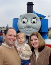Adoptive Family Photo: Riding Thomas the Tank Engine, click to view bigger version