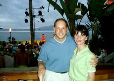 Adoptive Family Photo: Watching a Luau at Sunset in Hawaii, click to view bigger version