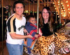 Adoptive Family Photo: One of Martonio�s Favorites: Carousels, click to view bigger version