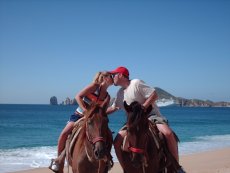 Adoptive Family Photo: Sneaking a Kiss in Mexico, click to view bigger version