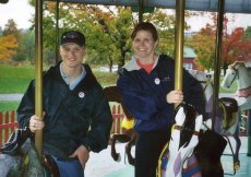 Adoptive Family Photo: Riding a Carousel at<br>Shelburne Museum in Vermont, click to view bigger version
