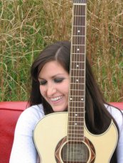 Adoptive Family Photo: Jana Plays Guitar, Writes Music, and Sings, click to view bigger version