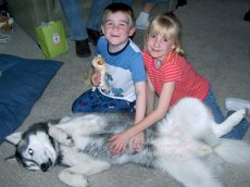 Adoptive Family Photo: Our Nephew Garrett and Our Niece Rachel with Our Dog Sierra, click to view bigger version