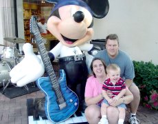 Adoptive Family Photo: Checking Out Mickey Mouse, click to view bigger version