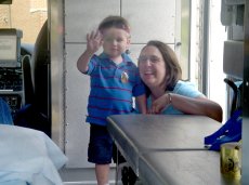 Adoptive Family Photo: Zack and Mom on an Ambulance Tour, click to view bigger version