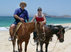 Adoptive Family Photo: Riding Horses on the Beach in <br>Cabo San Lucas, click to view bigger version
