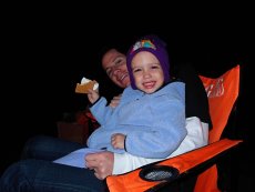Adoptive Family Photo: Having S'mores by the Fire, click to view bigger version