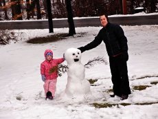 Adoptive Family Photo: Building a Snowman, click to view bigger version