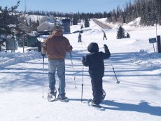 Adoptive Family Photo: Dennis Teaching Jake to Snowshoe, click to view bigger version