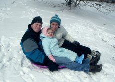 Adoptive Family Photo: Sledding Fun, click to view bigger version