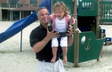Adoptive Family Photo: �Swing Me Higher!�, click to view bigger version