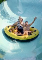 Adoptive Family Photo: At an Amusement Park with <br>My Niece and Nephews who<br>Promised Me I Wouldn�t <br>Get Wet (Not)., click to view bigger version