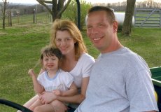 Adoptive Family Photo: Riding on the �Gator� at Randy�s <br>Parents� Home, click to view bigger version