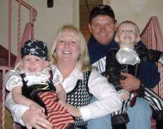Adoptive Family Photo: With Our God Children<br>on Halloween, click to view bigger version