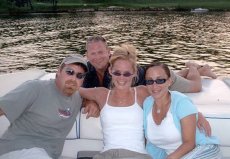 Adoptive Family Photo: Us Boating at the Lake with Friends, click to view bigger version