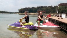 Adoptive Family Photo: Dan and Emily Jet Skiing at Our Lake<br> Home on Fish Lake, click to view bigger version