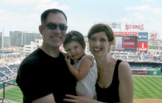 Adoptive Family Photo: Enjoying a Baseball Game, click to view bigger version