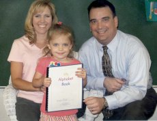 Adoptive Family Photo: Preschool Graduation, click to view bigger version