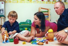 Adoptive Family Photo: Playing Mr. Potato Heads, click to view bigger version