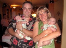 Adoptive Family Photo: Holding Newest Cousins Chris <br>and Constantine, click to view bigger version
