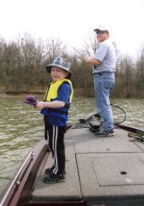 Adoptive Family Photo: Tim and John Enjoying a<br> Fishing Trip, click to view bigger version