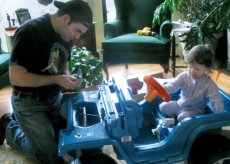 Adoptive Family Photo: Building a Car is Difficult!, click to view bigger version