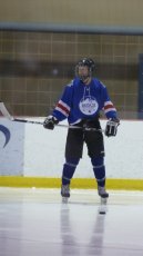 Adoptive Family Photo: Mark Loves Playing in His Hockey League, click to view bigger version