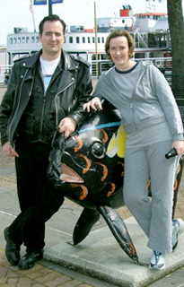 Adoptive Family Photo: Outside the Aquarium <br>of the Americas in <br>New Orleans, click to view bigger version