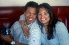 Adoptive Family Photo: Celebrating Art's Mother's Birthday at<br> a Favorite Family Restaurant. Art is <br>Ready to Capture the Moment with His <br>DVD, click to view bigger version