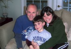 Adoptive Family Photo: Enjoying College Basketball at Home, click to view bigger version