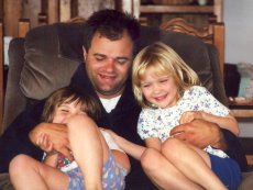 Adoptive Family Photo: Tickle Time After a Story, click to view bigger version