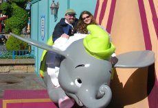 Adoptive Family Photo: Riding Dumbo at Disney World, click to view bigger version