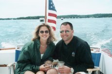 Adoptive Family Photo: Enjoying a Ride on Sydney�s Father�s <br>Boat in Maine, click to view bigger version