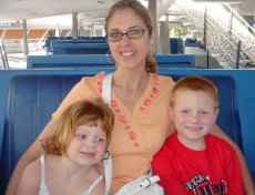 Adoptive Family Photo: Sydney with Eric�s Niece and <br>Nephew in Disney World, click to view bigger version