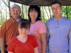 Adoptive Family Photo: Celebrating at Rebecca�s Father�s <br>75th Birthday Party, click to view bigger version