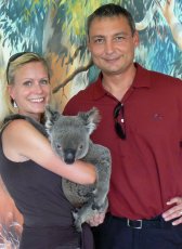 Adoptive Family Photo: Cuddling with Leo the Koala, click to view bigger version