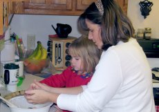 Adoptive Family Photo: Laura and Hope Making Cookies, click to view bigger version