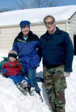 Adoptive Family Photo: Fun on a Snow Pile, click to view bigger version