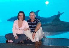 Adoptive Family Photo: Posing with the Dolphins<br>at the Aquarium, click to view bigger version