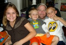 Adoptive Family Photo: Dogpile on Uncle Todd, click to view bigger version