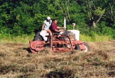 Adoptive Family Photo: Working the Field at Paul�s Parents� House, click to view bigger version