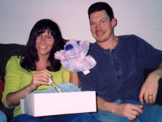 Adoptive Family Photo: Opening Our Wedding Presents, click to view bigger version