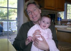 Adoptive Family Photo: Peter Cuddling Our Niece Amelia, click to view bigger version