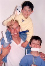 Adoptive Family Photo: Matthew Painting a<br>Bathroom with Katheryn�s <br>Brothers as Helpers, click to view bigger version