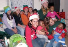 Adoptive Family Photo: Lori and Her 4-H Club at Christmas, click to view bigger version