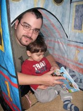 Adoptive Family Photo: Sam and Matt in Thomas<br> the Train Tent Reading <br>Books, click to view bigger version